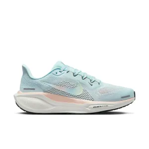 Women's Pegasus 41 PRM (474 - Glacier Blue/Multi-Color-Washed Coral) Contoured Footbed Geometry running in a train station area shoes