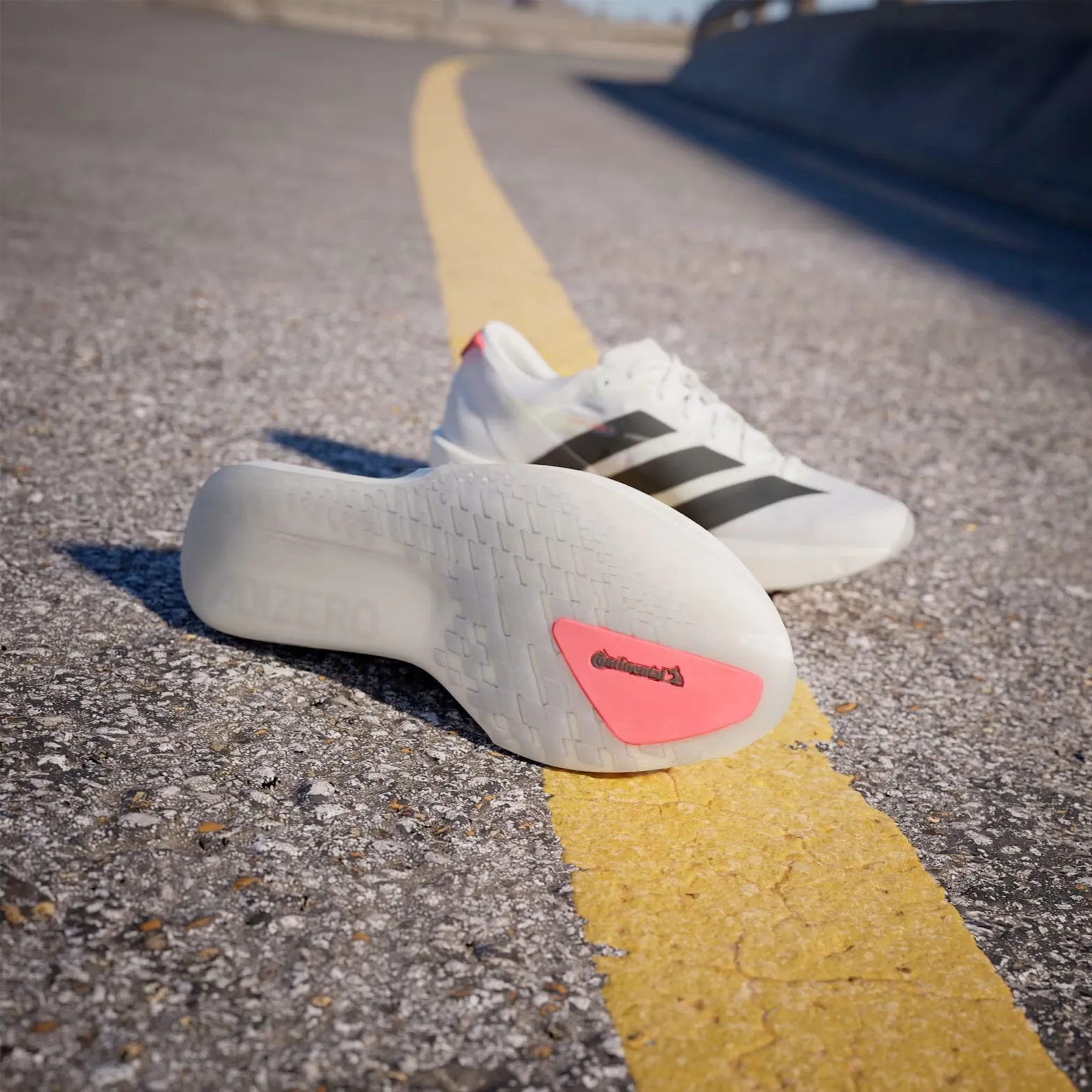 Women's Adizero Adios 9 Running Shoes Cloud White / Core Black / Lucid Red Dynamic Traction Pattern