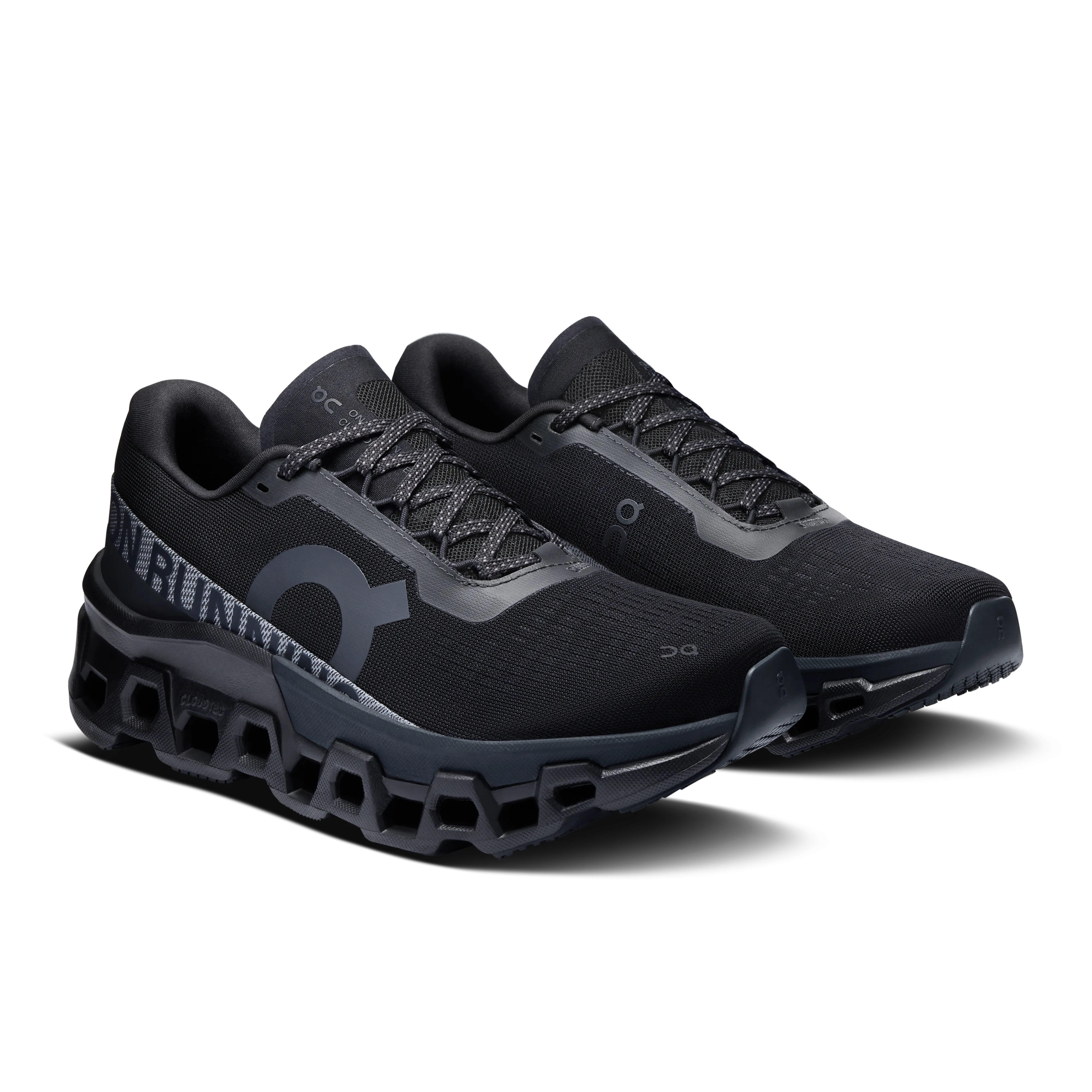 Dual Density Cushioning running in a nature reserve On Women's Cloudmonster 2 Running Shoes Black / Eclipse