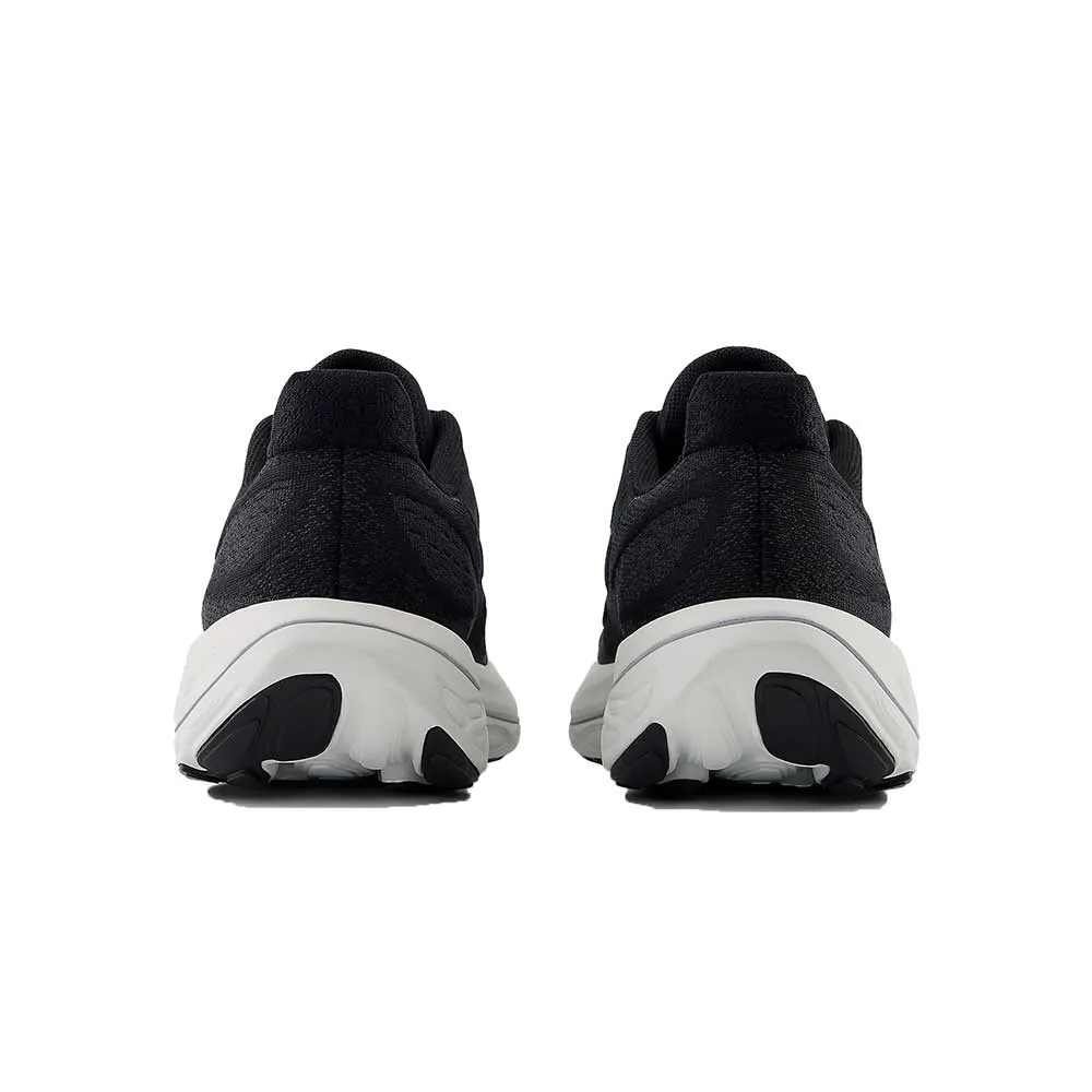 arch - hugging Women's Vongo v6 Running Shoe - Black/White - Regular (B)