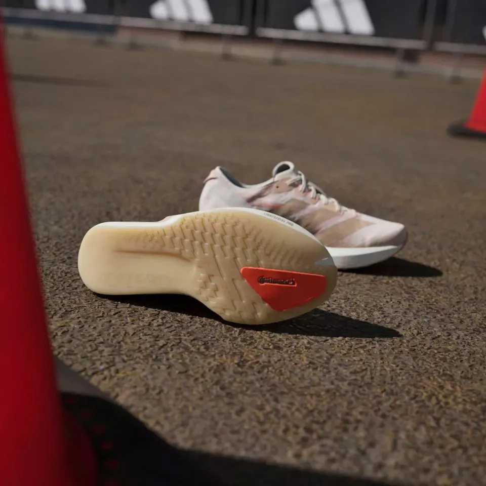 Strobel Board Construction running with headphones Women's Adizero Adios 9 Running Shoes Chalk White / Warm Sandstone / Impact Orange