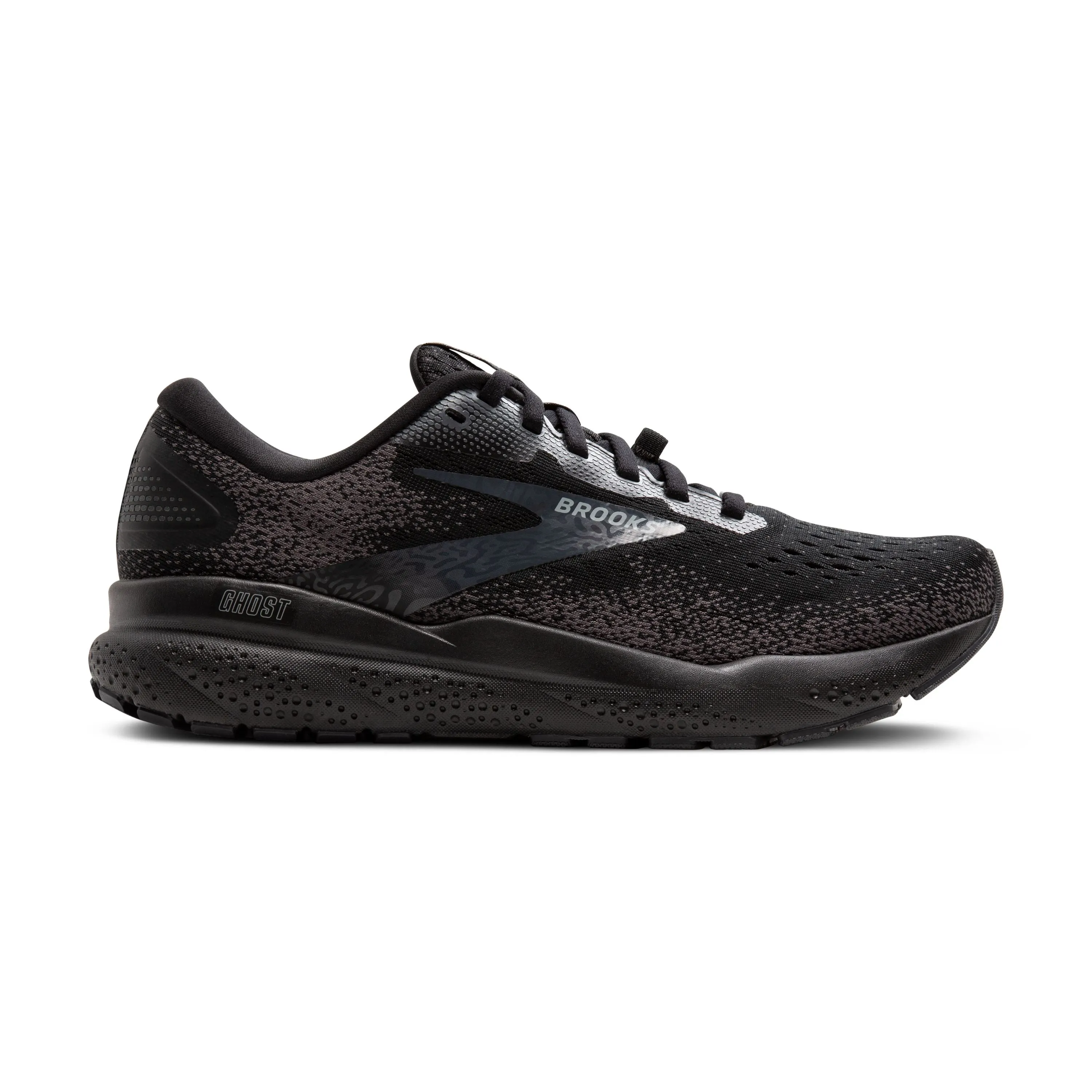 Brooks | Ghost 16 GTX | Women's | Black/Black/Ebony Compression Lock Lacing running in a subway station area shoes