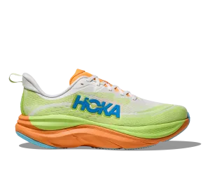 Women's Skyflow (FSTS - Frost/Solar Flare) running in a marsh area shoes Light - colored