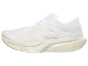 Strategic Support Webbing running on a dirt path New Balance | FuelCell Rebel v4 | Women's | White/Linen/Sea Salt